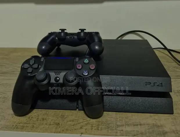 PS4 Standard Console with 12 Games & 2 Controllers - 1
