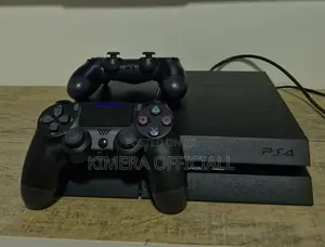 PS4 Standard Console with 12 Games & 2 Controllers