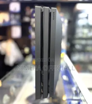 PS4 Pro with 12 Games & 2 Controllers
