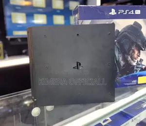 PS4 Slim Console with 12 Games & 2 Controllers