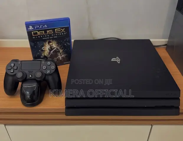 PS4 Pro with 12 Games, 2 Controllers - 1