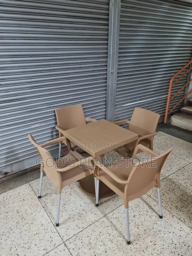 Fanback Plastic Chairs and Table - 1