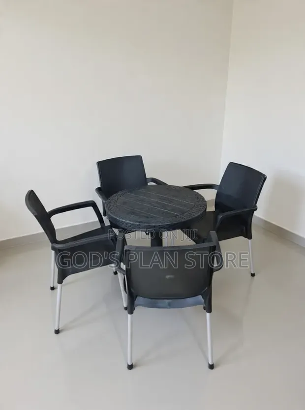 Brand New Plastic Outdoor Table and 4 Chairs - 1