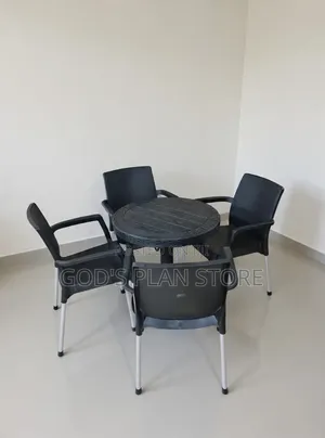 Brand New Plastic Outdoor Table and 4 Chairs