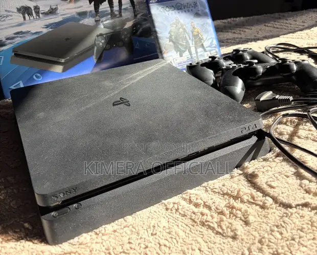 PS4 Slim Console with 12 Games & 2 Controllers - 1