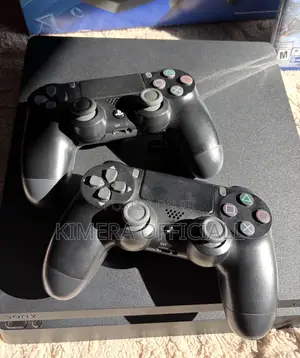 PS4 Slim Console with 12 Games & 2 Controllers