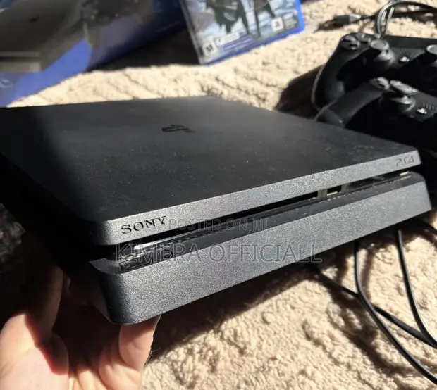 PS4 Slim Console with 12 Games & 2 Controllers - 1