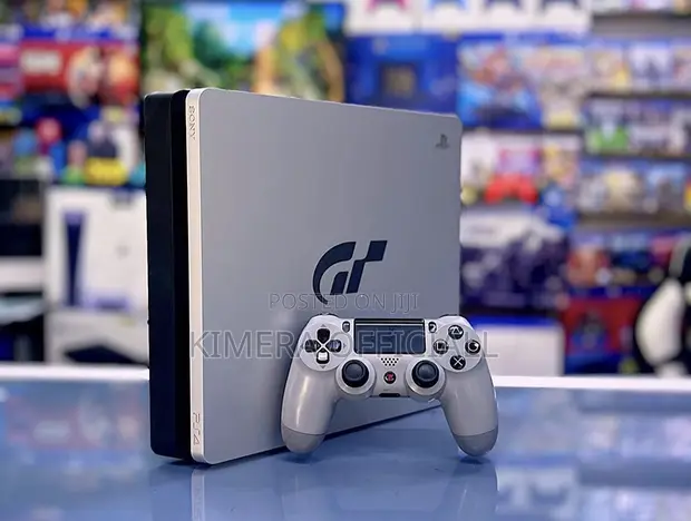 PS4 Slim with 12 Games and 2 Controllers - 1