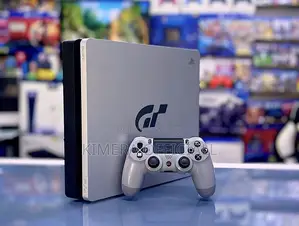 PS4 Slim with 12 Games and 2 Controllers