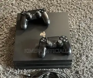 PS4 Pro Console with 12 Games and 2 Controllers