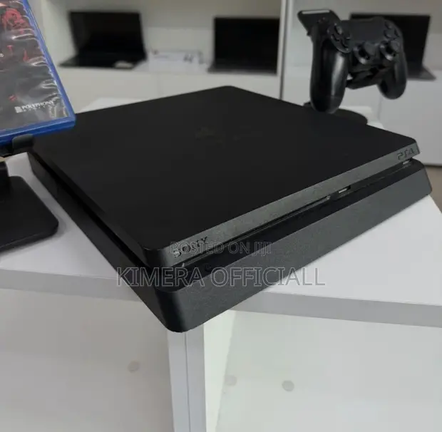 PS4 Slim Console with 12 Games and 2 Controllers - 1