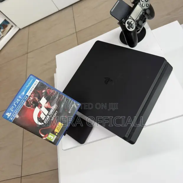 PS4 Slim Console with 12 Games & 2 Controllers - 1