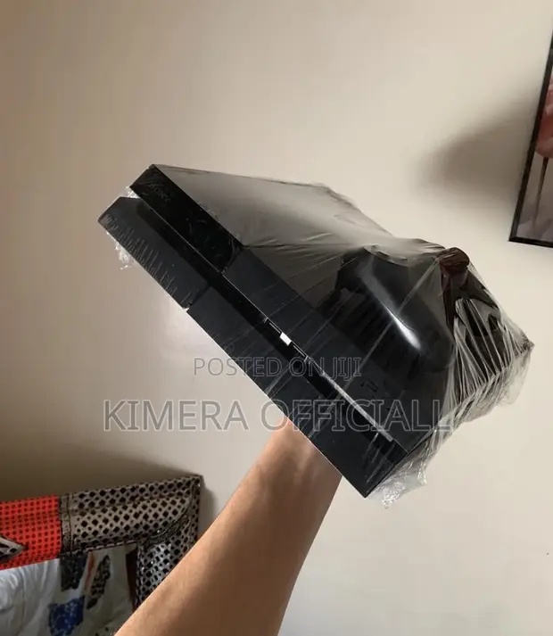 PS4 Standard Console with 12 Games & 2 Controllers - 1