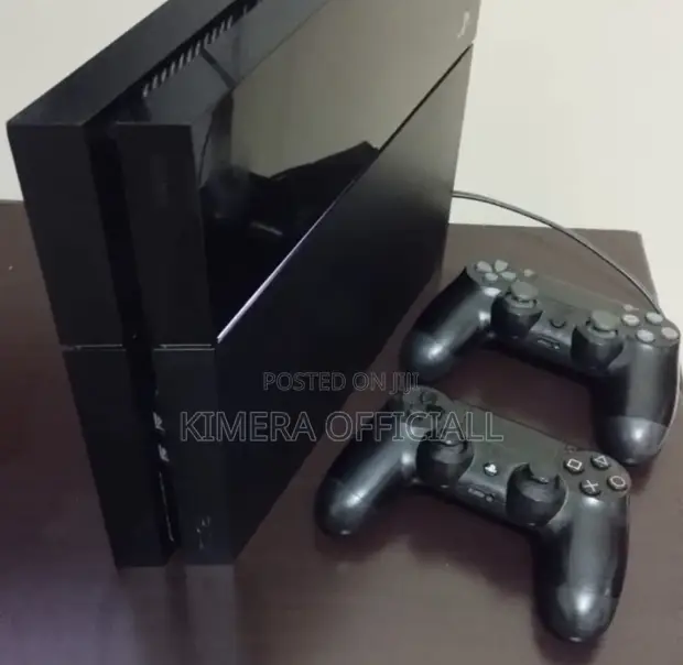 PS4 Standard Console with 12 Games & 2 Controllers - 1