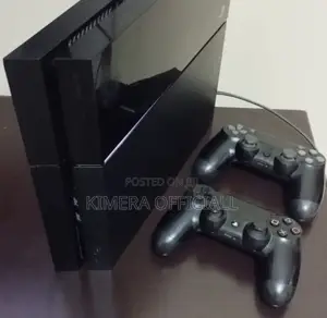 PS4 Standard Console with 12 Games & 2 Controllers