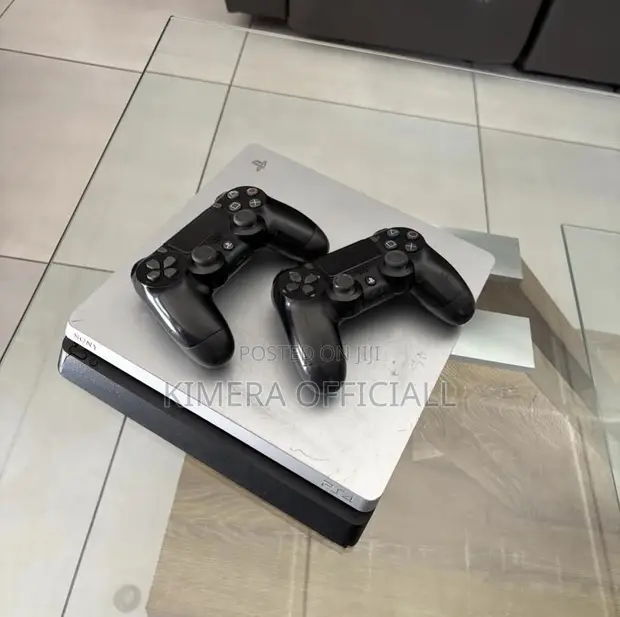 PS4 Slim Console with 12 Games & 2 Controllers - 1