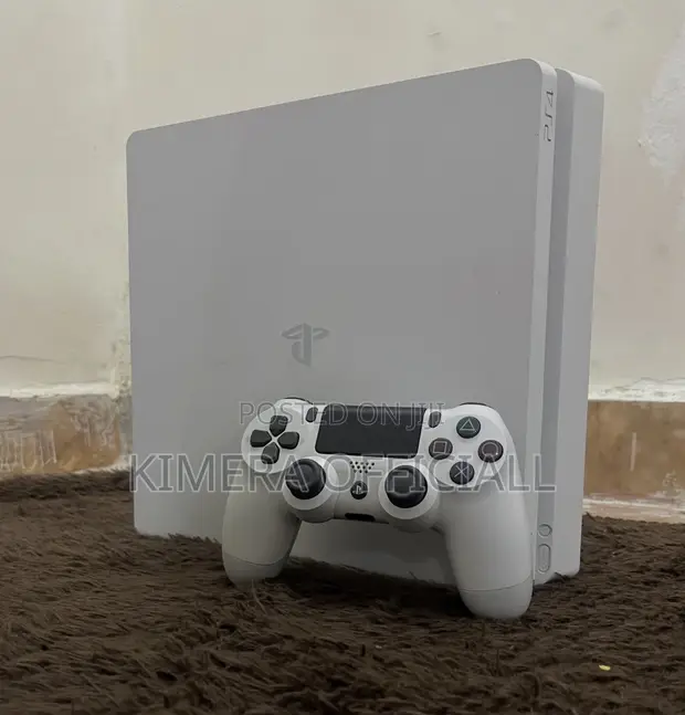 PS4 Slim Console with 12 Games & 2 Controllers - 1