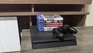 PS4 Slim Console with 12 Games & 2 Controllers