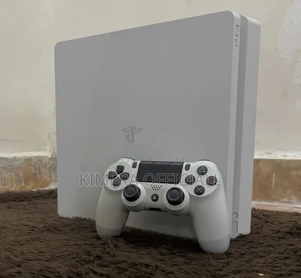 PS4 Slim Console with 12 Games & 2 Controllers - 1