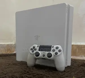 PS4 Slim Console with 12 Games & 2 Controllers