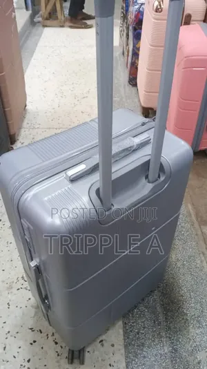 Medium Gray Plastic Suitcase