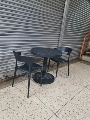 Exotic Black Dining Table and 2 Chairs