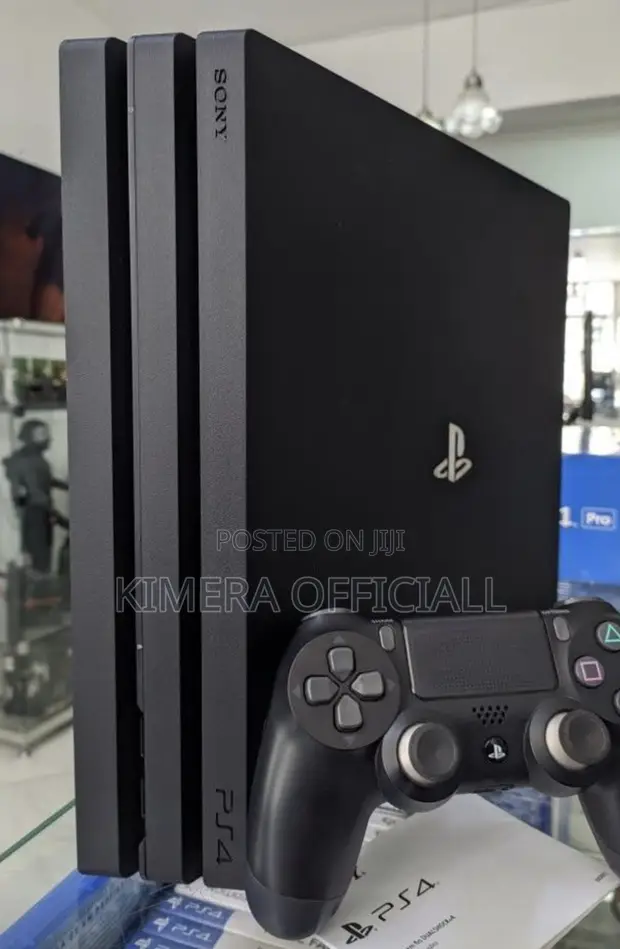 PS4 Pro Console with 12 Games & 2 Controllers - 1
