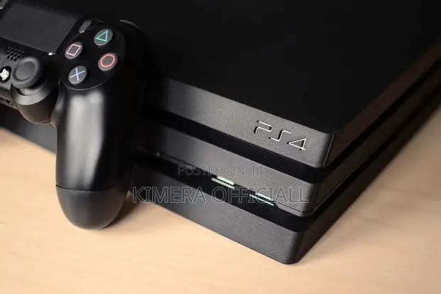 PS4 Pro with 12 Games and 2 Controllers - 1
