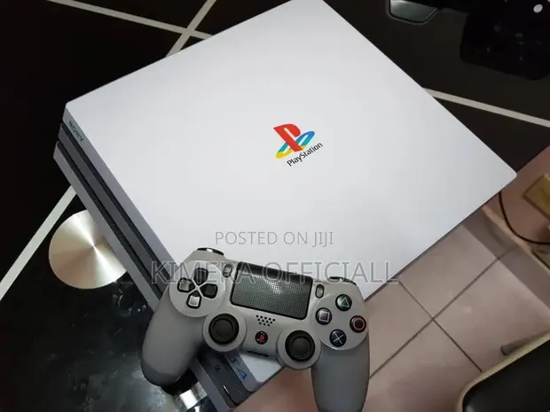 PS4 Pro with 12 Games and 2 Controllers - 1