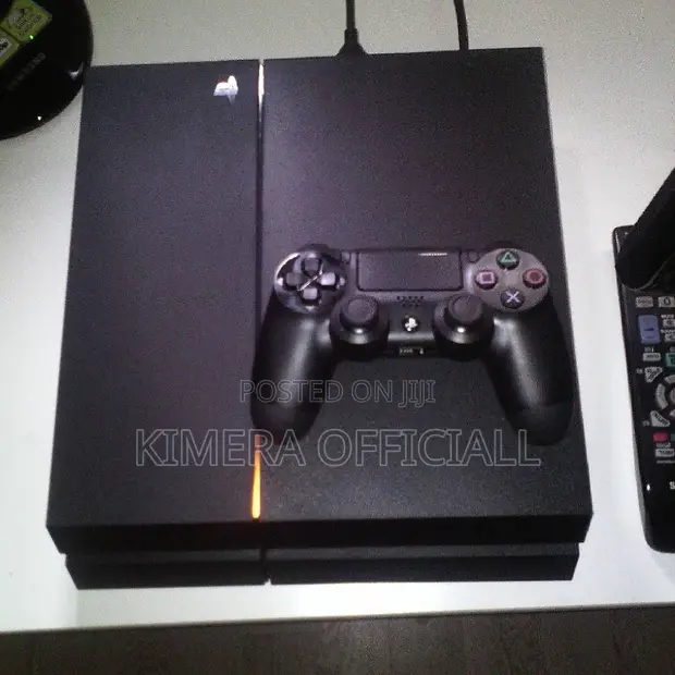 PS4 Standard Console with 12 Games & 2 Controllers - 1