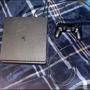 PS4 Slim Console with 12 Games & 2 Controllers