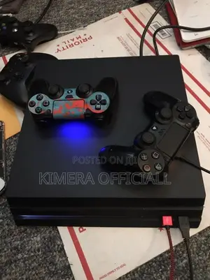 PS4 Pro with 12 Games, 2 Controllers