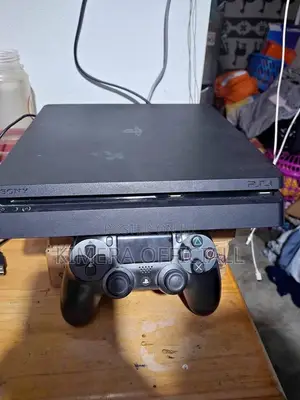 PS4 Slim with 12 Games and 2 Controllers
