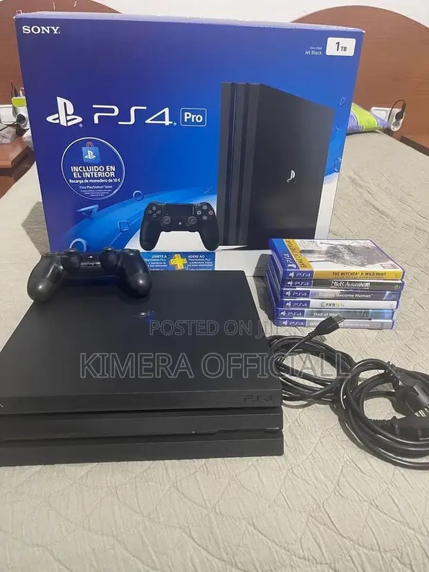 PS4 Pro with 12 Games and 2 Controllers - 1