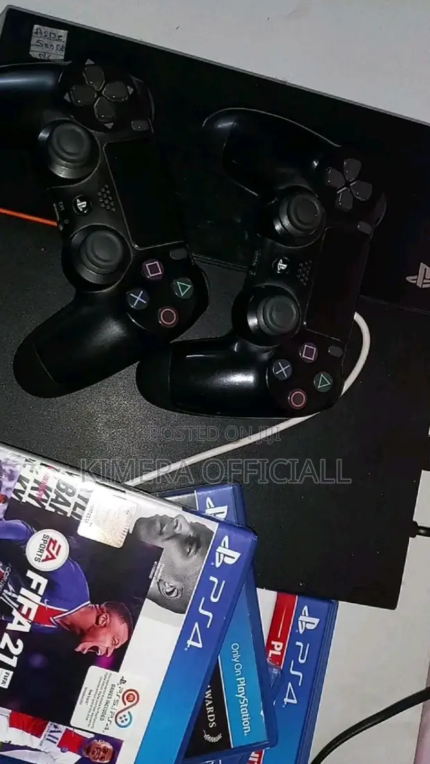 PS4 Standard Console with 12 Games & 2 Controllers - 1