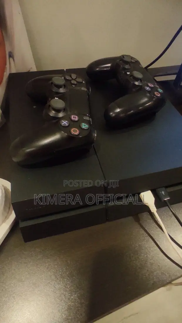 PS4 Standard Console with 12 Games & 2 Controllers - 1