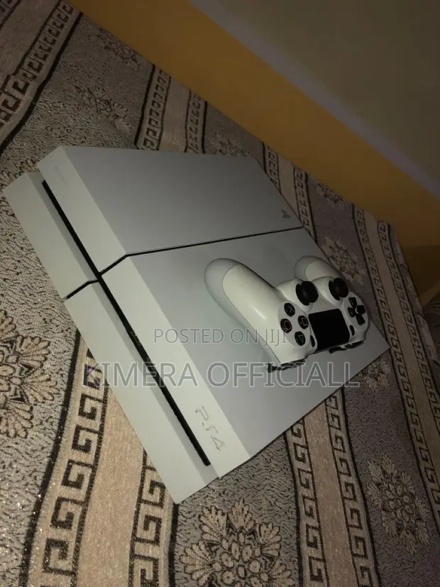 PS4 Standard Console with 12 Games & 2 Controllers - 1