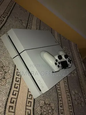 PS4 Standard Console with 12 Games & 2 Controllers