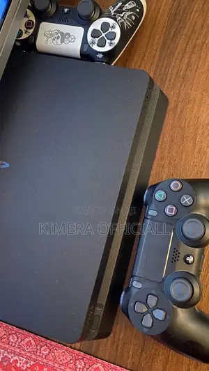 PS4 Slim Console with 12 Games & 2 Controllers