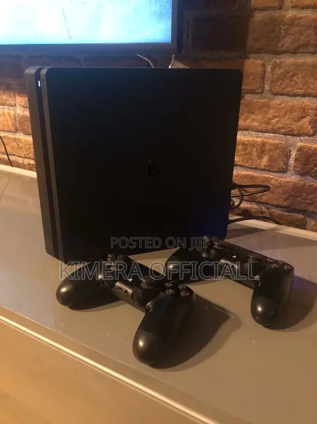 PS4 Slim Console with 12 Games & 2 Controllers - 1