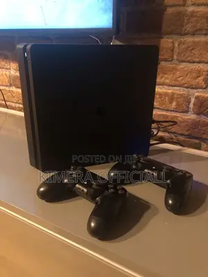 PS4 Slim Console with 12 Games & 2 Controllers