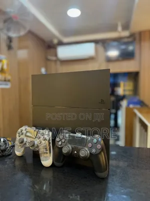PS4 Fat Console with 12 Games and 2 Controllers