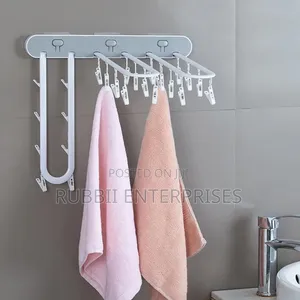 Wall-Mounted Drying Rack with Pegs