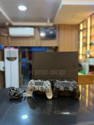 PS4 Standard with 12 Games and 2 Controllers