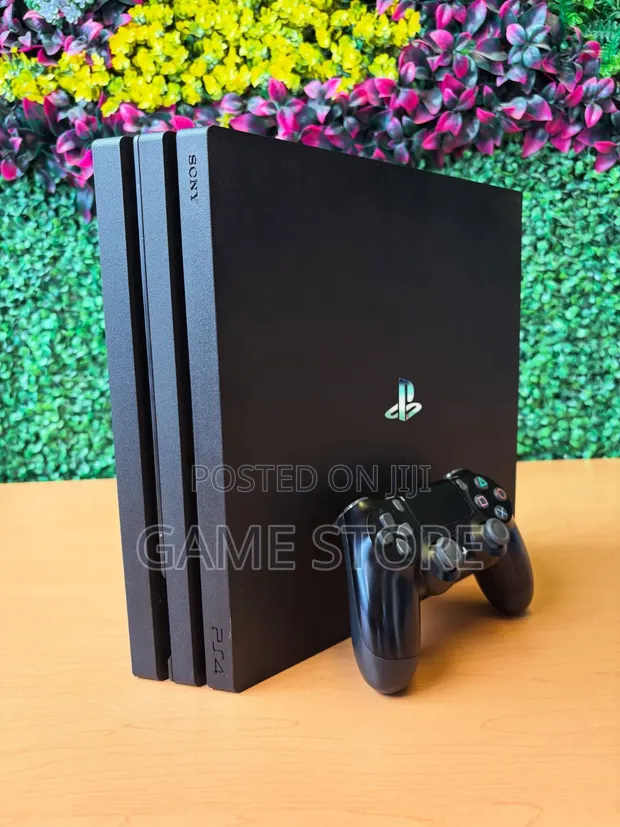 PS4 Pro with 12 Games and 2 Controllers - 1