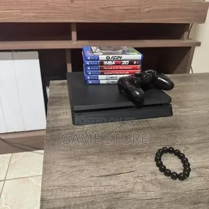 PS4 Slim Console with 12 Games & 2 Controllers