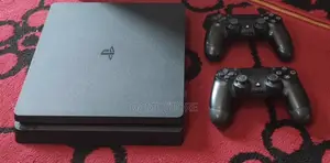 PS4 Slim Console with 12 Games & 2 Controllers