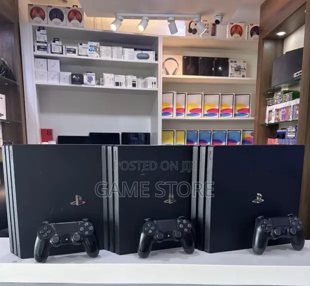 PS4 Pro with 12 Games and 2 Controllers - 1