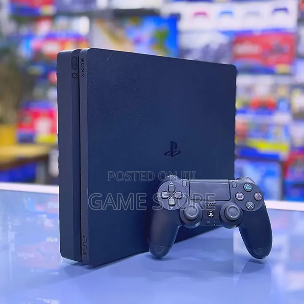 PS4 Slim Console with 12 Games & 2 Controllers - 1