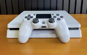 PS4 Slim Console with 12 Games & 2 Controllers